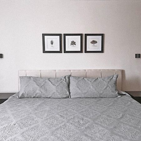 Suites Ciento 37 Леон Экстерьер фото
